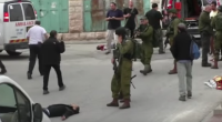 Sta circolando molto in Israele un video che mostra un soldato israeliano sparare alla testa a un attentatore palestinese ferito e immobile, sdraiato per terra. Il video è stato girato a Hebron, in Cisgiordania, la mattina di giovedì 24 marzo da un dipendente della nota ONG “B’Tselem”: è particolarmente impressionante perché l’attentatore si muoveva a malapena ed era strettamente sorvegliato da una decina di altri soldati. A un certo punto del video si vede un soldato (in secondo piano, alle spalle di quello più vicino all’uomo a terra) caricare il suo mitra e sparargli un colpo alla testa, senza che nessuno provi a fermarlo. Tutti […]